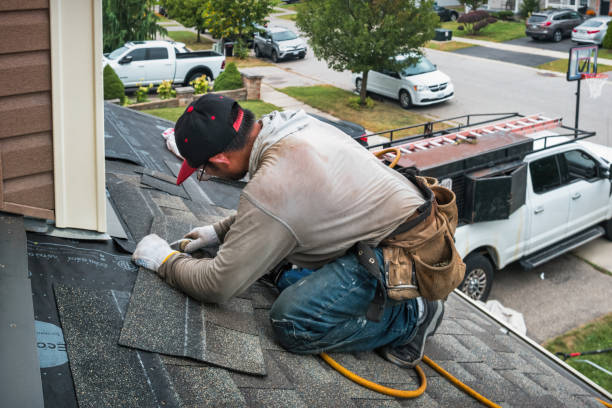 Professional Roofing technician working in Berthoud, CO